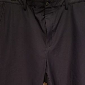 Blue Footjoy golf shorts.